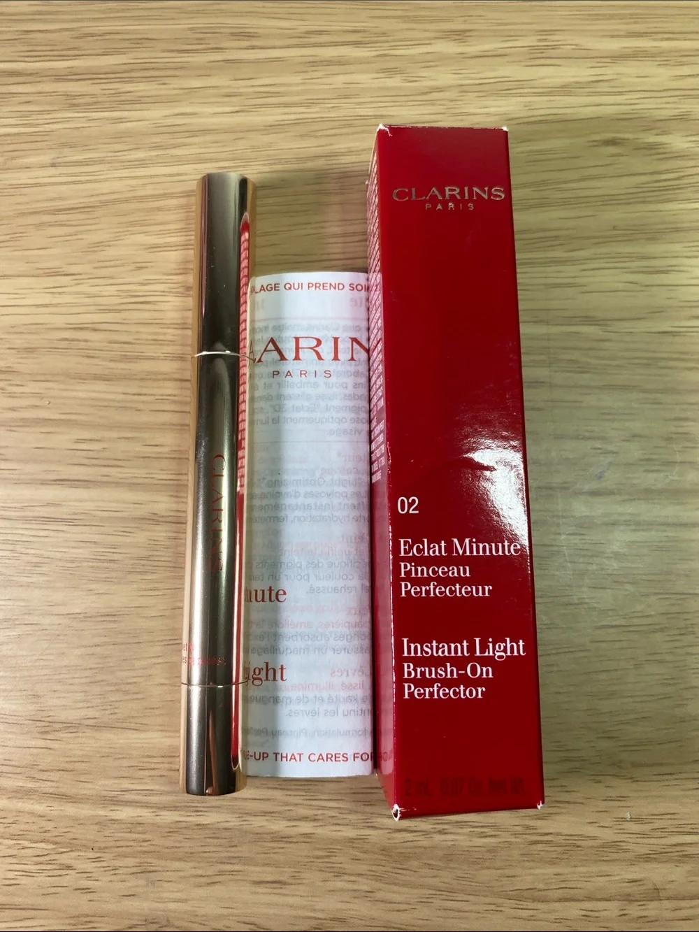 Clarins Instant Light Brush-On Perfector — Red Packaging